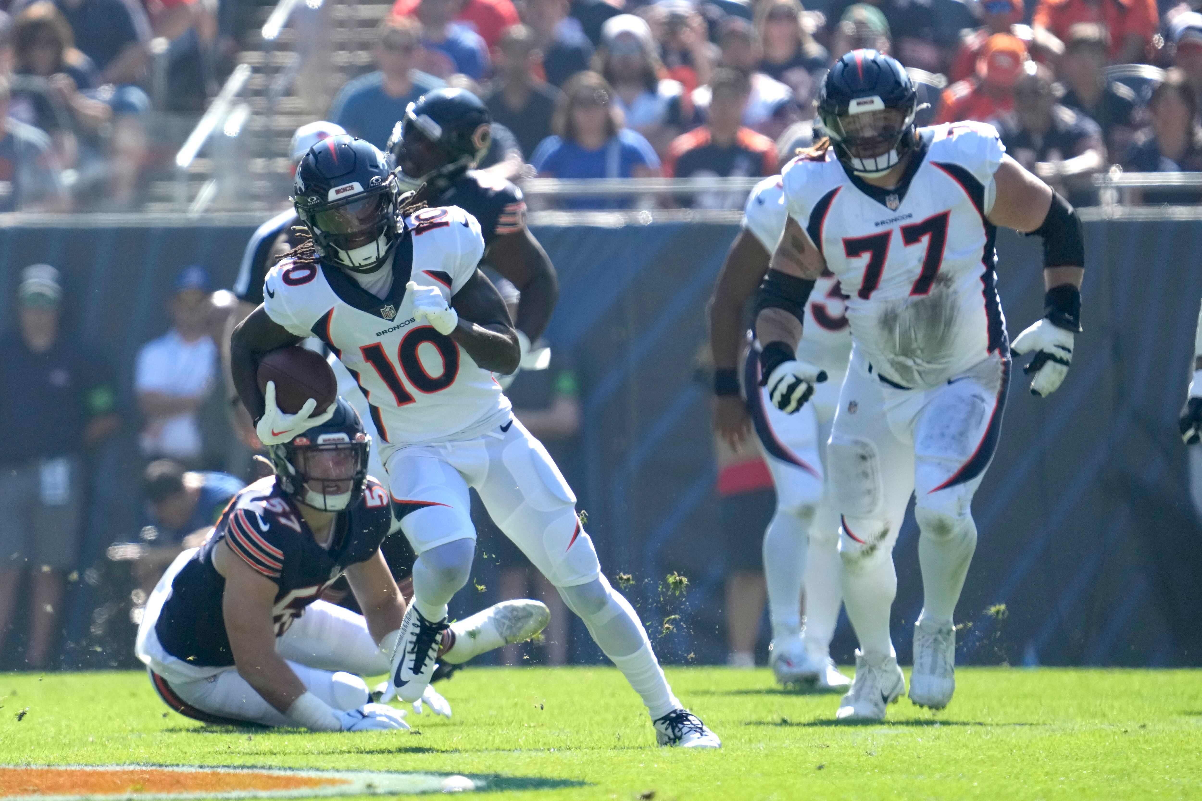 Russell Wilson throws 3 TDs, Broncos rally from 21 down to top Bears 31-28