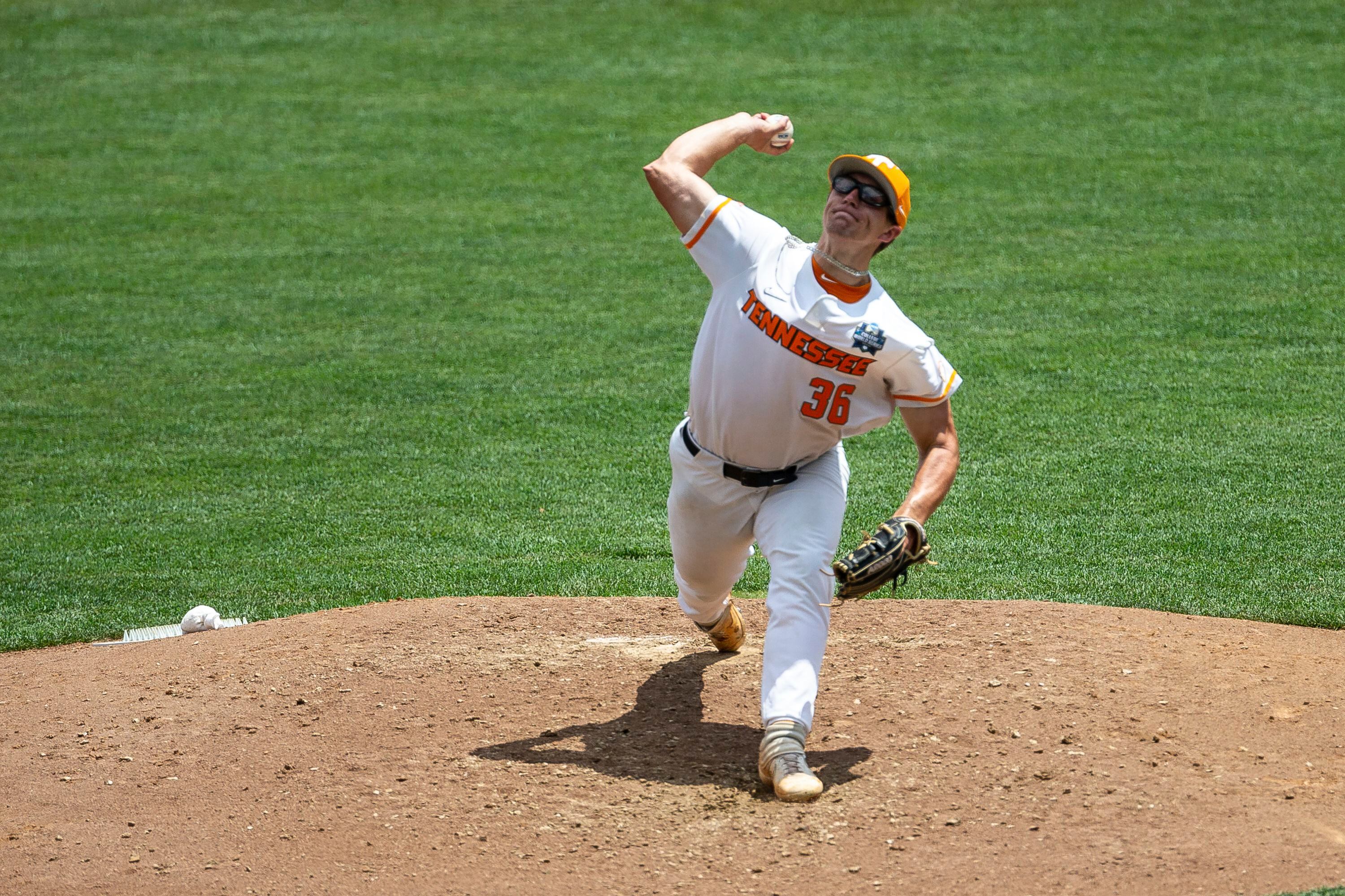 Michaels, Abbott lead Virginia past Vols 6-0 in CWS opener