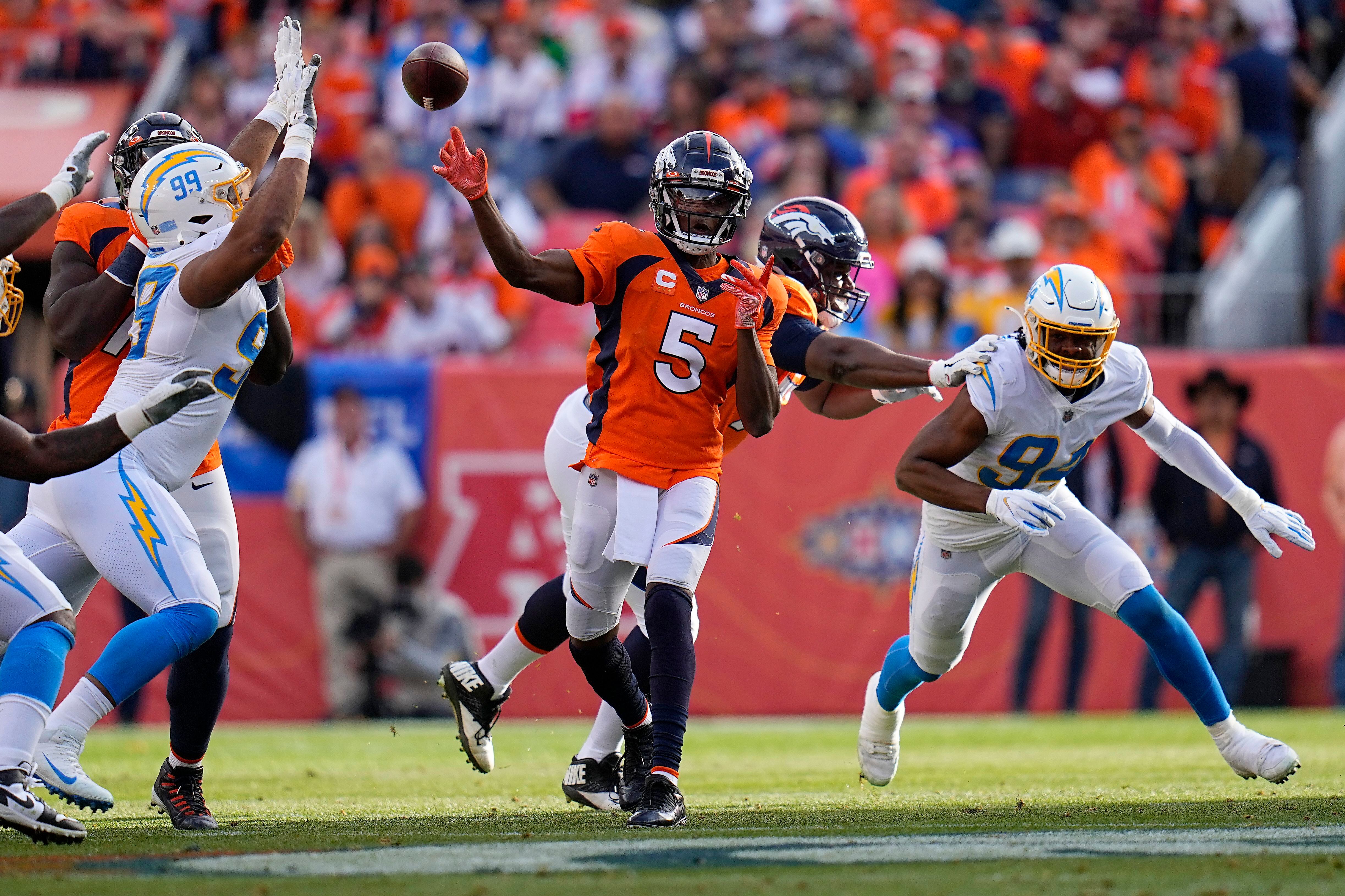 Interceptions lead to Chargers' 28-13 loss to Broncos