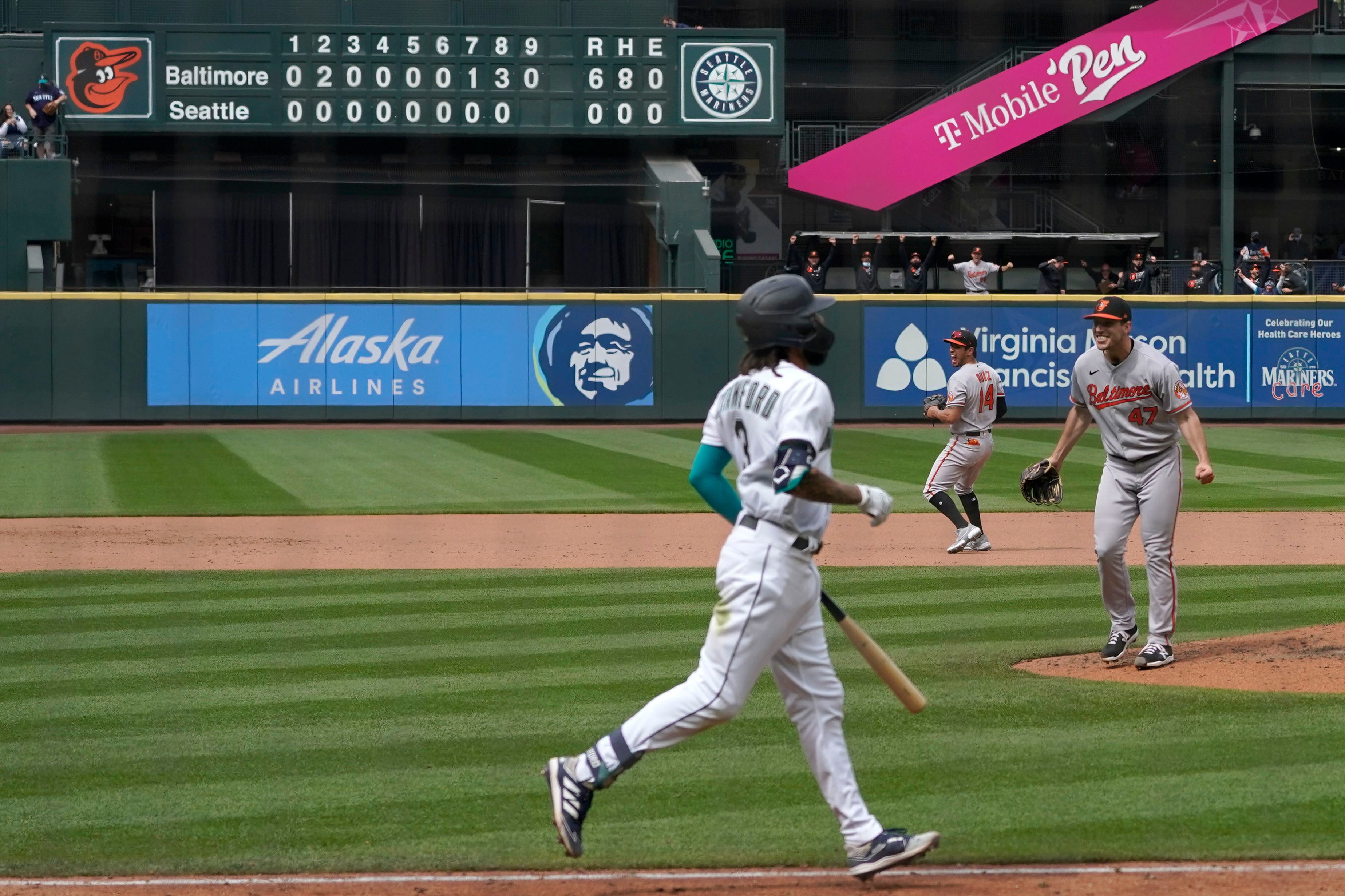 CLEVELAND, OH - APRIL 09: Seattle Mariners shortstop J.P. Crawford (3)  throws to first base for an out during the tenth inning of the Major League  Baseball game between the Seattle Mariners