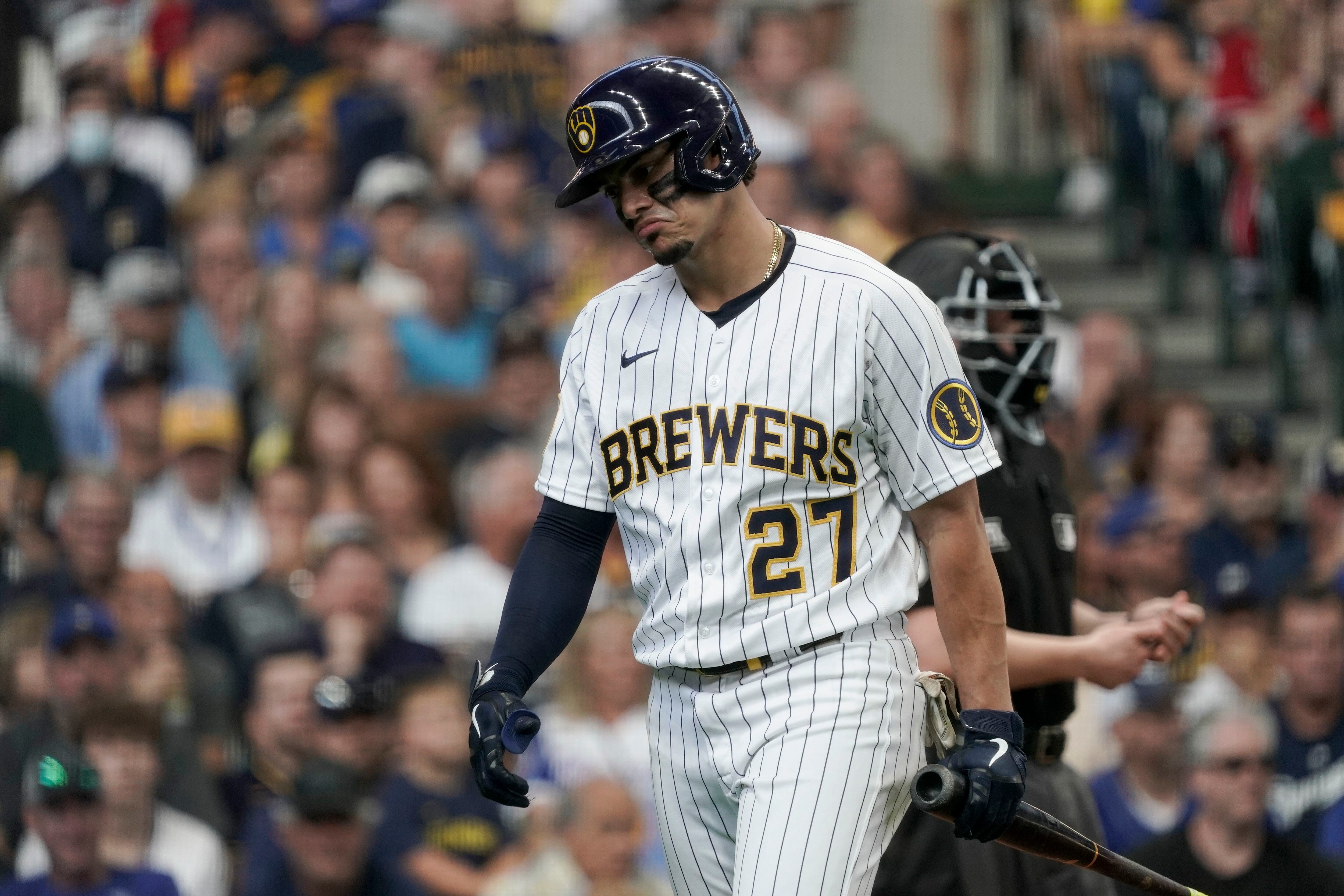 Tellez HR, throw spark Brewers over Braves 2-1 in Game 1