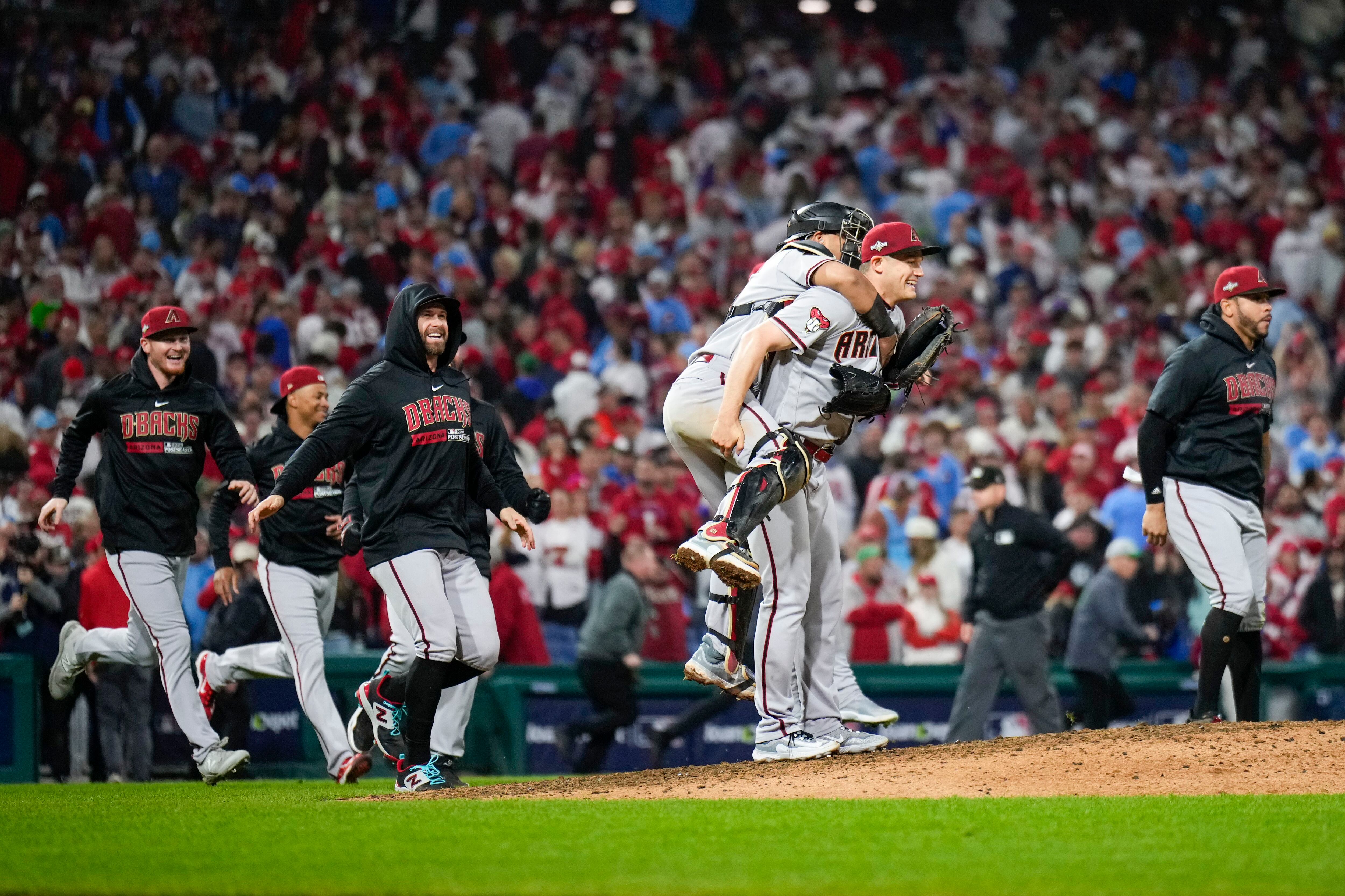 Phillies advance to NLCS, knock out defending champs behind Marsh